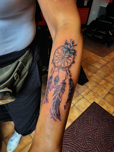 Explore astronomical tattoo ideas, creative tattoo ideas in Minocqua, available at Walking Arts Tattoos