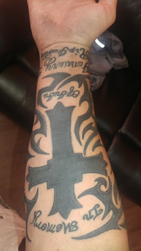 Explore matching cat tattoo ideas, creative tattoo ideas in Bessemer City, available at Twisted Ink