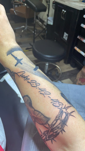 Explore skull and rose tattoo ideas, creative tattoo ideas in Buffalo, available at The Emerald Rose Tattoo and Fine Arts