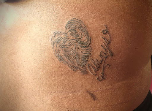 Explore stomach tattoo ideas for females, creative tattoo ideas in Bessemer, available at The Savage Patch