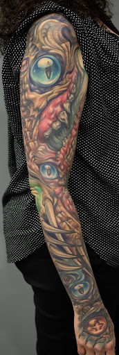 Explore jesus tattoo sleeve ideas, creative tattoo ideas in Luverne, available at Conspiracy Tattoo MN