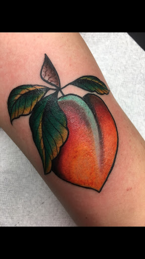 Find tattoo ideas for woman on leg for your next unique tattoo in Atlanta at Big Cat Tattoo