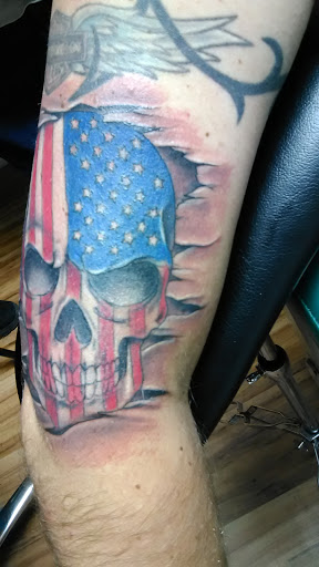 Explore ghost cat tattoo ideas, creative tattoo ideas in Owosso, available at Expressions Body Art Studio