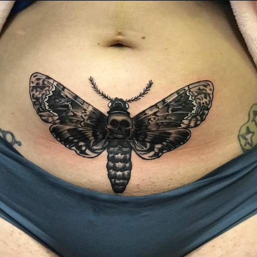 Find simple mens tattoo ideas for your next unique tattoo in Girard at Empress Tattoos FKA Treehouse Tattoo