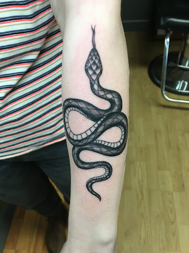 Explore amsterdam tattoo ideas, creative tattoo ideas in Asheville, available at Unification Tattoo