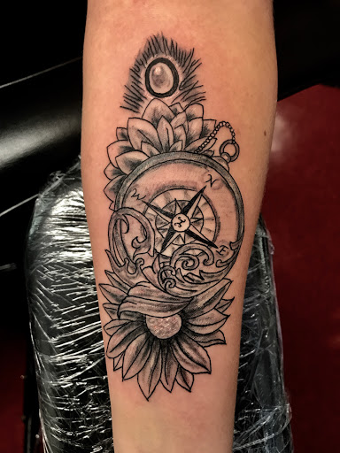 Explore whitetail deer tattoo ideas, creative tattoo ideas in Charlottesville, available at Mystic Tattoo and Body Piercing