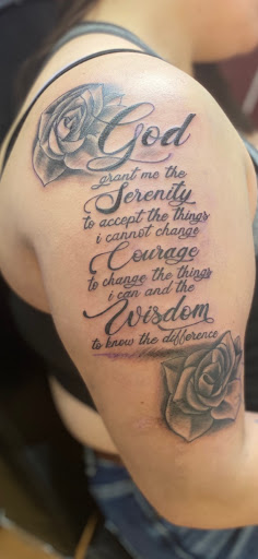 Explore american flag sleeve tattoo ideas, creative tattoo ideas in Milwaukee, available at West Allis Tattoo & Gallery Tattoo Shop Milwaukee