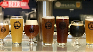 A row of beer taps