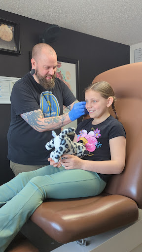 Explore shoulder scar tattoo ideas, creative tattoo ideas in Moorhead, available at CBA (Chucks Body Art)