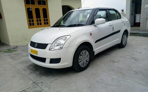 Patahnkot taxi service and Guru Arjan dev Travels image