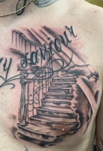 Explore dark tattoo ideas for men, creative tattoo ideas in Warner Robins, available at Untold Pain Tattoo Studio