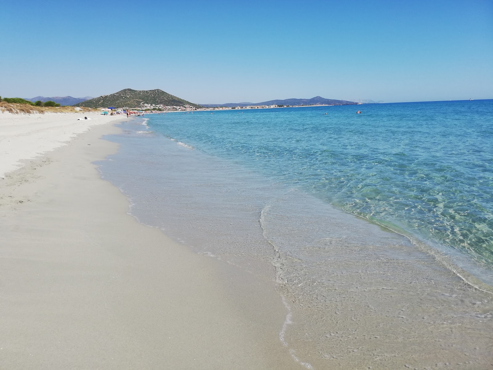 Spiaggia La Caletta'in fotoğrafı geniş plaj ile birlikte