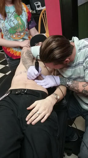 Tattoo Shop «Art In Motion Inc Tattooing», reviews and photos, 415 S Broadway St, Medina, OH 44256, USA