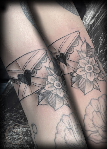 Explore women's half sleeve tattoo ideas, creative tattoo ideas in Houlton, available at Crowes Tattoos