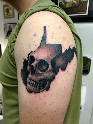 Explore be strong tattoo ideas, creative tattoo ideas in Marietta, available at Monkeys Uncle Tattoo