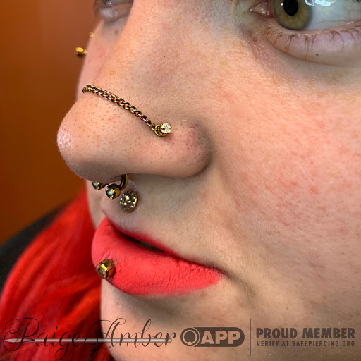 Explore rhea ripley tattoo ideas, creative tattoo ideas in Oshkosh, available at Piercings by Paige at Big Guns Tattoo