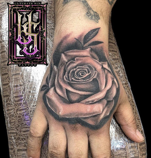 Explore ocean wave tattoo ideas, creative tattoo ideas in Chicago, available at Ultimate Sin Tattoo Piercing Parlor