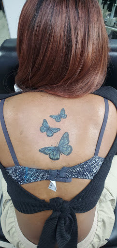 Explore back shoulder tattoo ideas for men, creative tattoo ideas in Cuyahoga Falls, available at Sick Skins Skin Art Studio