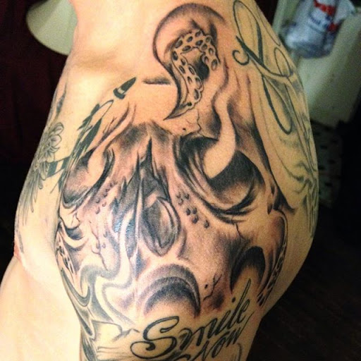 Explore tattoo half sleeve ideas male, creative tattoo ideas in Cleveland, available at Tattoo Cafe