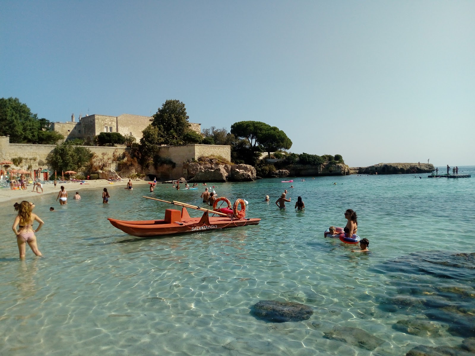 Foto de Porto Ghiacciolo beach - lugar popular entre os apreciadores de relaxamento