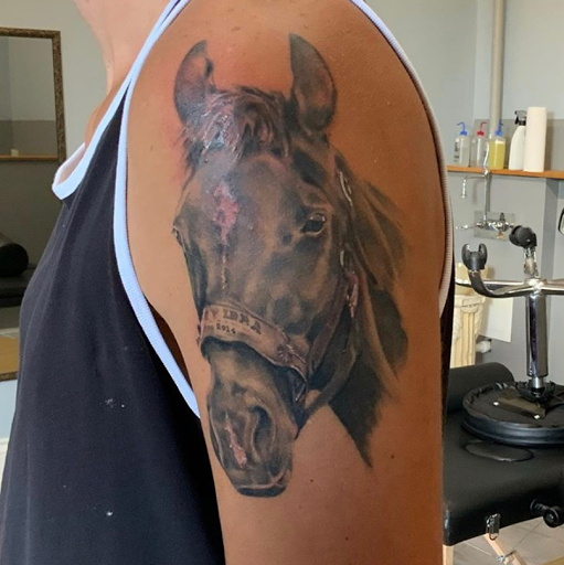 Explore skull rose tattoo ideas, creative tattoo ideas in Louisville, available at Prophecy Ink Tattoo Studio & Fine Art Gallery