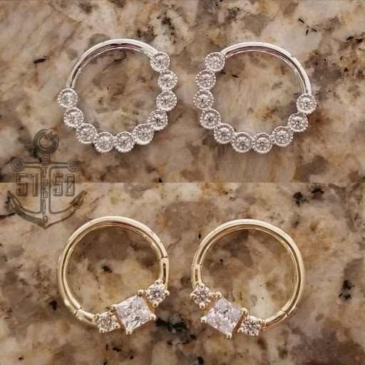 Explore symbol tattoo ideas, creative tattoo ideas in Kearney, available at Studio 5150 Piercing & Fine Jewelry