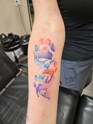 Explore rose thigh tattoo ideas, creative tattoo ideas in Auburndale, available at Till Death Tattoo Studio