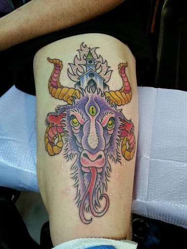 Explore lion tattoo ideas, creative tattoo ideas in Clayton, available at Black Pearl Tattoo Company