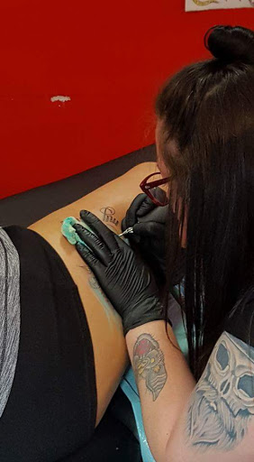 Find cool armband tattoo ideas for your next unique tattoo in Spartanburg at Lucky Dice Tattoo Shop Spartanburg