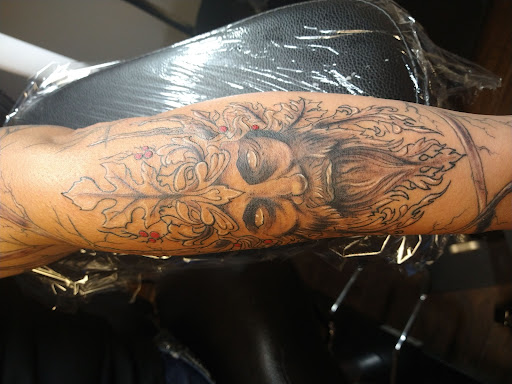 Explore armband tattoo ideas for men, creative tattoo ideas in Lexington, available at Tempest Tattoo Studio