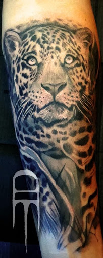 Explore snowboarding tattoo ideas, creative tattoo ideas in Sarasota, available at SEVEN SINS Tattoo Studio