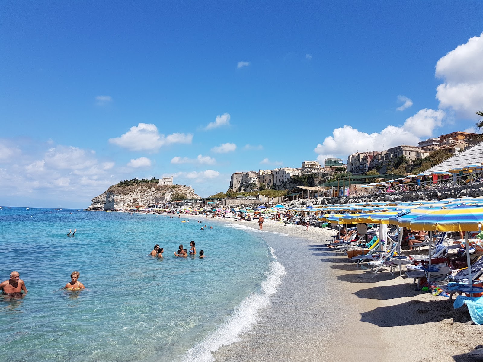 Photo of Tropea Beach with bright sand surface