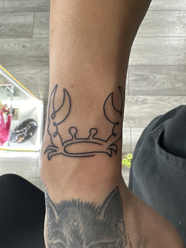 Explore religious elbow tattoo ideas, creative tattoo ideas in Las Vegas, available at 70Duece Tattoos