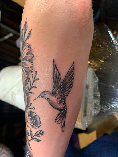 Explore loyalty over love tattoo ideas, creative tattoo ideas in San Antonio, available at Ink & Iron Tattoos & Piercings