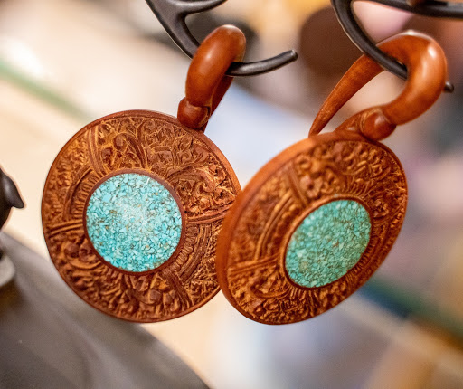 Explore mens angel tattoo ideas, creative tattoo ideas in Summerville, available at Exotic Impressions Body Piercing