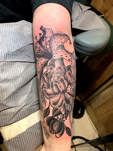 Explore women half sleeve tattoo ideas, creative tattoo ideas in Cape Coral, available at UNRIVALED INK