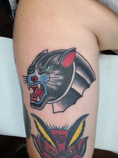 Explore blacked out tattoo ideas, creative tattoo ideas in Canton, available at Bound For Glory Ink Tattoo Company