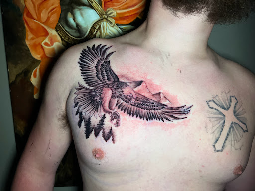 Explore cover up tattoo ideas lower back, creative tattoo ideas in Roanoke, available at Saint Cecilias Art Studio