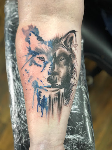 Explore tattoo ideas for freedom, creative tattoo ideas in Huntington, available at Golden Dagger Tattoos and Piercings