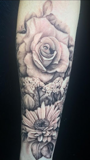 Explore female neck tattoo ideas, creative tattoo ideas in Mesa, available at Ranger Tattoo & Piercing