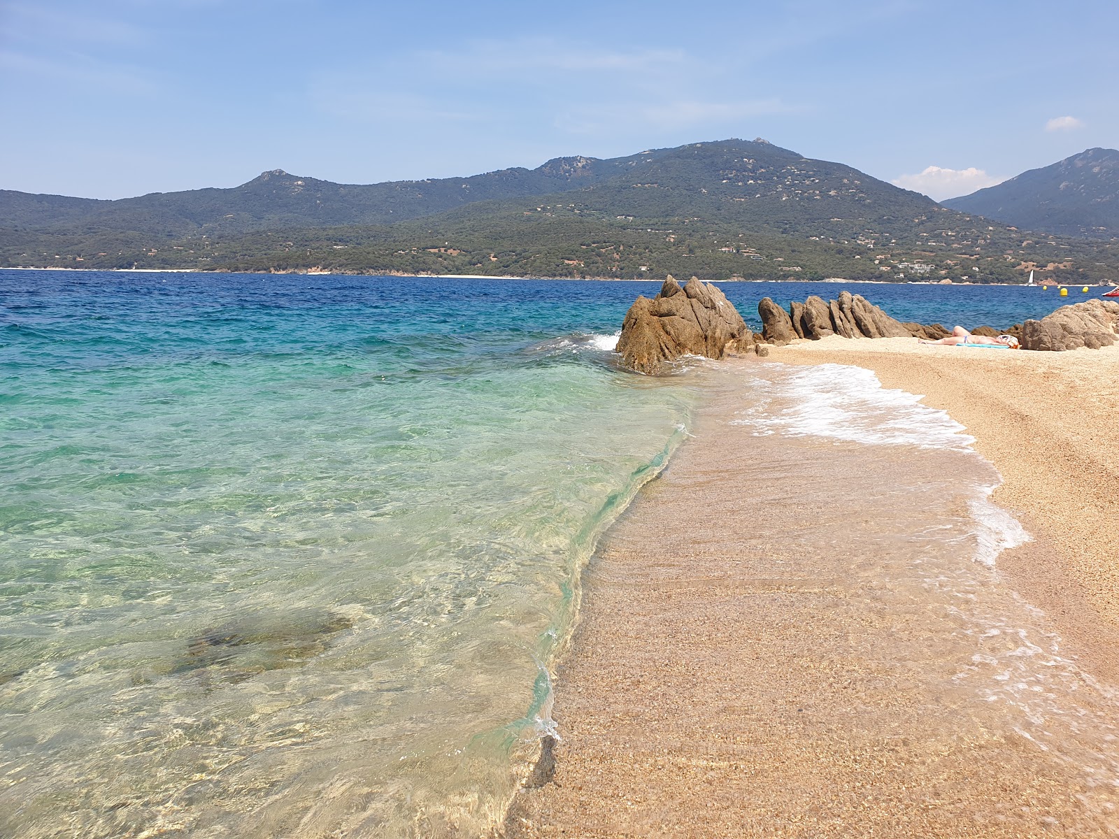 Foto di Spiaggia del Lido con una superficie del sabbia beige fine
