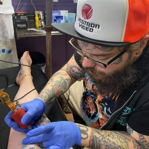 Explore ideas for ring tattoos, creative tattoo ideas in Rochester, available at Body Creations Tattoo & Body Piercing