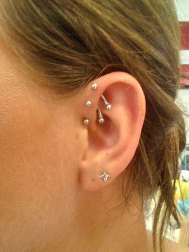 Explore spine tattoo ideas male, creative tattoo ideas in Myrtle Beach, available at Pitbull Tattoo and Piercing Clinic