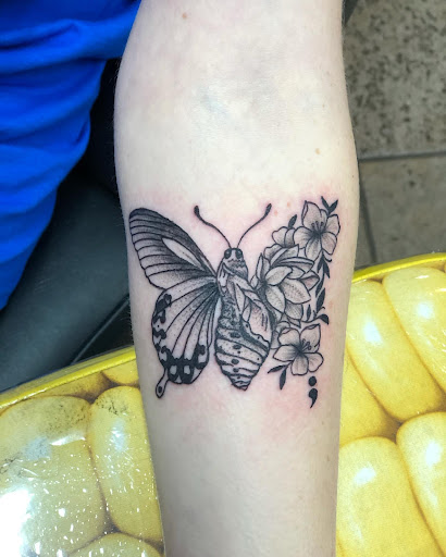 Explore tattoo ideas on back of neck, creative tattoo ideas in Nashua, available at Mayhem Ink Tattoo