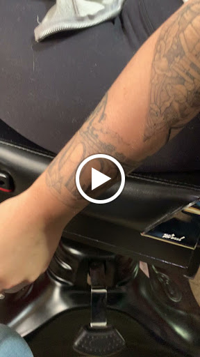 Explore lower back tattoo cover up ideas, creative tattoo ideas in Dover, available at Walls of Wonder Tattoo And Body Piercing