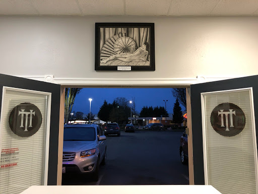 Explore arm tribal tattoo cover up ideas, creative tattoo ideas in Kent, available at Ivy Ink Tattoo