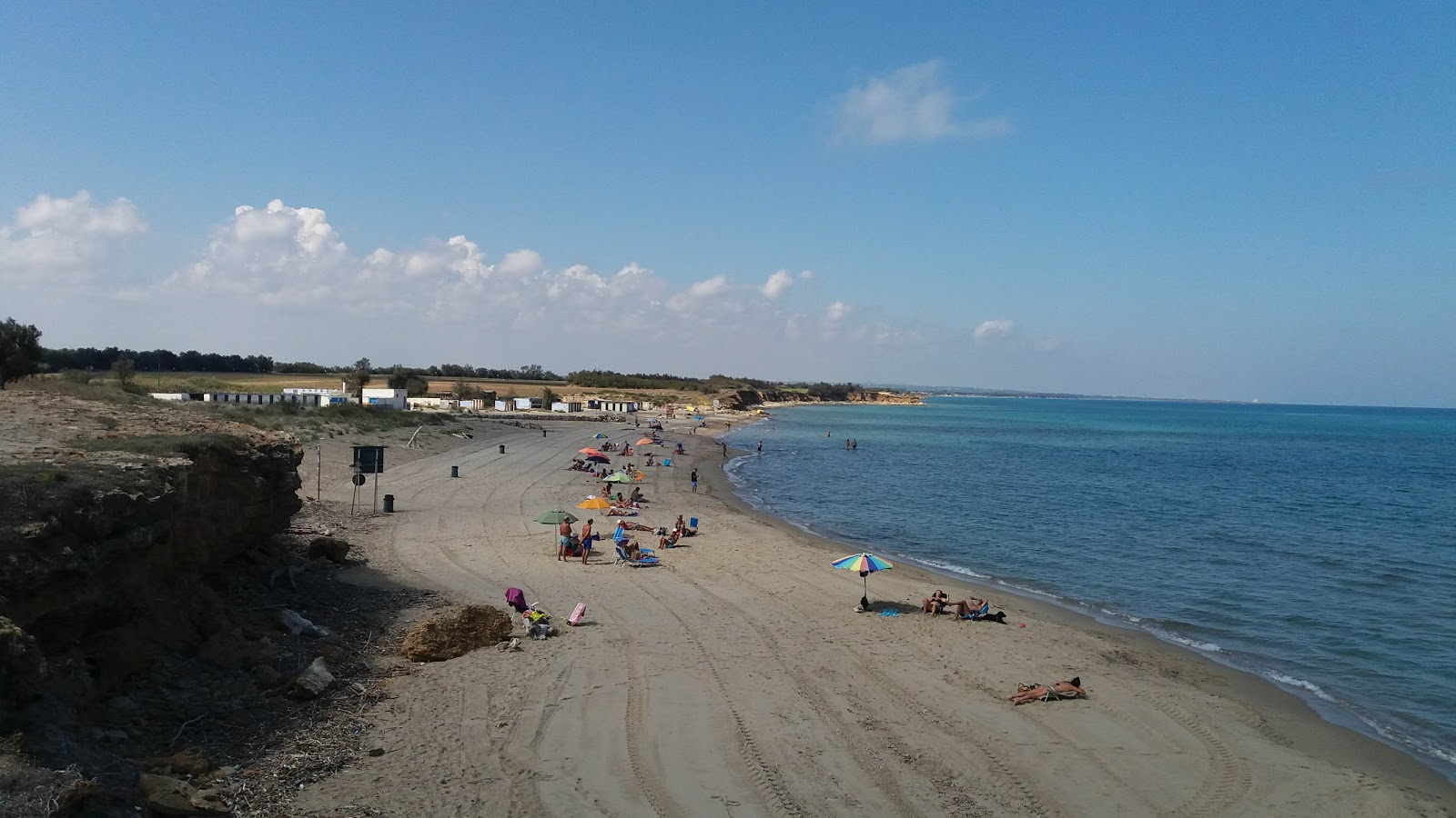 Spiaggia di Torre Testa'in fotoğrafı geniş bir kıyı şeridi ile birlikte
