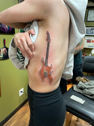 Explore leg sleeve tattoo ideas for women, creative tattoo ideas in Chicago, available at Shreds Inferno Custom Tattoos