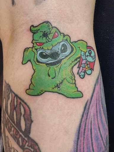 Find charm bracelet tattoo ideas for your next unique tattoo in Toledo at 4 Nineteen Ink