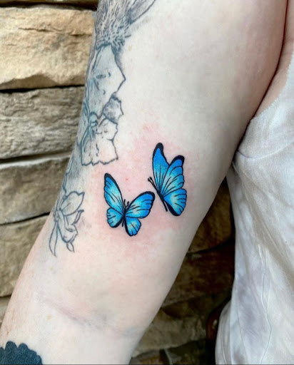 Find angel tattoo ideas for females for your next unique tattoo in Davenport at Fine Ink Studios Tattoos